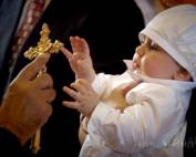 Catholic Christening of a Baby Boy being Blessed by the Priest
