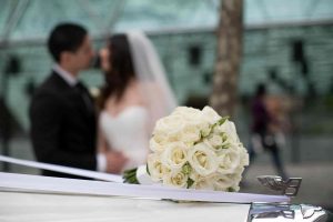 sydney-wedding-bride-and-groom-boquet-rest-on-the-hood-of-roll-up-in-a-roll-classic-bentley-1575-20170304-CAM-min
