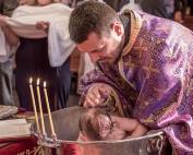 Andrjea-is-baptised-by-immersing-her-in-the-holy-water-at-the-ceremony-for-Baby-Girl-Christening-at-Macedonian-Orthodox-Church-Wollongong-600px