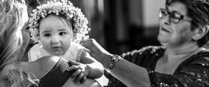 sydney-christening-video-and-photography-captures-a-baby-just-after-baptism-embrace-by-her-Godmother-and-grandmother